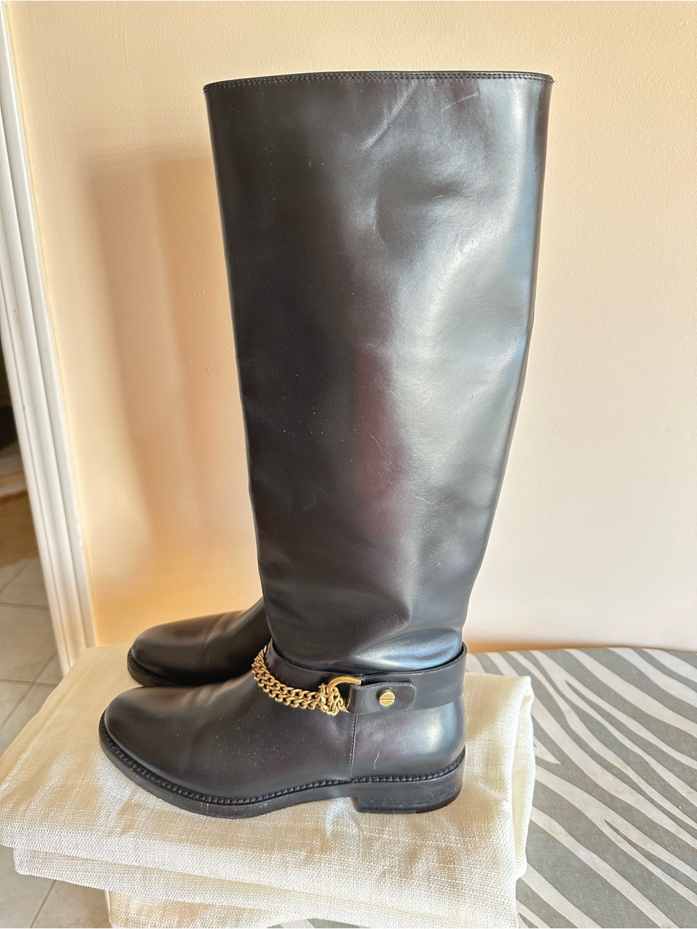 Black tall leather boots